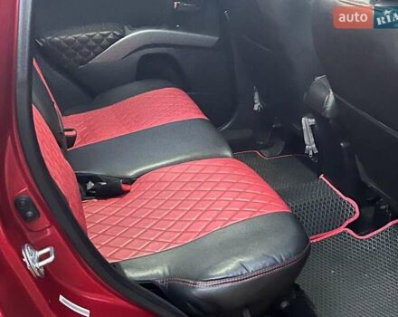 Красный Мицубиси Аутлендер, объемом двигателя 2.4 л и пробегом 251 тыс. км за 8990 $, фото 20 на Automoto.ua