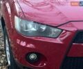 Красный Мицубиси Аутлендер, объемом двигателя 2.4 л и пробегом 251 тыс. км за 8990 $, фото 3 на Automoto.ua
