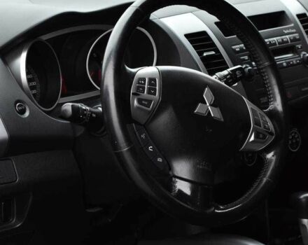 Красный Мицубиси Аутлендер, объемом двигателя 2.4 л и пробегом 204 тыс. км за 9499 $, фото 8 на Automoto.ua