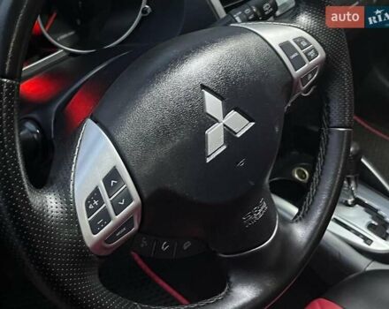 Красный Мицубиси Аутлендер, объемом двигателя 2.4 л и пробегом 251 тыс. км за 8990 $, фото 29 на Automoto.ua