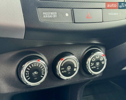 Красный Мицубиси Аутлендер, объемом двигателя 2 л и пробегом 204 тыс. км за 10350 $, фото 26 на Automoto.ua