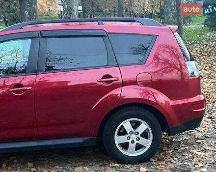 Красный Мицубиси Аутлендер, объемом двигателя 2.4 л и пробегом 251 тыс. км за 8990 $, фото 6 на Automoto.ua
