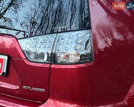 Красный Мицубиси Аутлендер, объемом двигателя 2.4 л и пробегом 251 тыс. км за 8990 $, фото 11 на Automoto.ua
