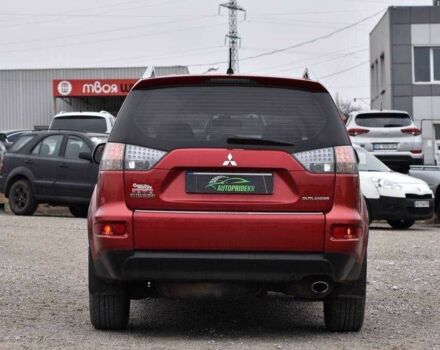 Красный Мицубиси Аутлендер, объемом двигателя 2.4 л и пробегом 204 тыс. км за 9499 $, фото 2 на Automoto.ua