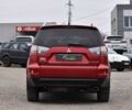 Красный Мицубиси Аутлендер, объемом двигателя 2.4 л и пробегом 204 тыс. км за 9499 $, фото 2 на Automoto.ua