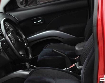 Красный Мицубиси Аутлендер, объемом двигателя 2.4 л и пробегом 204 тыс. км за 9499 $, фото 6 на Automoto.ua