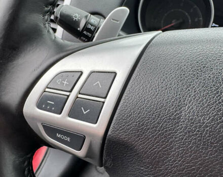 Красный Мицубиси Аутлендер, объемом двигателя 2 л и пробегом 204 тыс. км за 10350 $, фото 21 на Automoto.ua