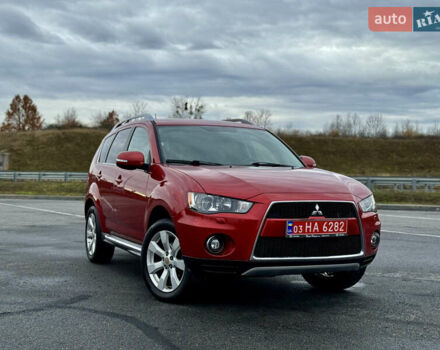 Красный Мицубиси Аутлендер, объемом двигателя 2 л и пробегом 204 тыс. км за 10350 $, фото 41 на Automoto.ua