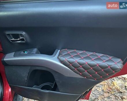 Красный Мицубиси Аутлендер, объемом двигателя 2.4 л и пробегом 251 тыс. км за 8990 $, фото 21 на Automoto.ua