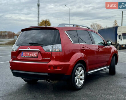 Красный Мицубиси Аутлендер, объемом двигателя 2 л и пробегом 204 тыс. км за 10350 $, фото 6 на Automoto.ua