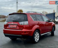 Красный Мицубиси Аутлендер, объемом двигателя 2 л и пробегом 204 тыс. км за 10350 $, фото 6 на Automoto.ua