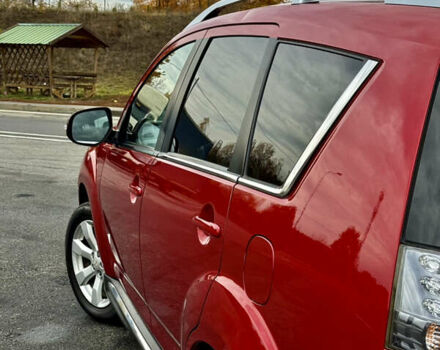 Красный Мицубиси Аутлендер, объемом двигателя 2 л и пробегом 204 тыс. км за 10350 $, фото 16 на Automoto.ua