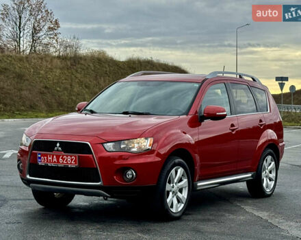 Красный Мицубиси Аутлендер, объемом двигателя 2 л и пробегом 204 тыс. км за 10350 $, фото 8 на Automoto.ua