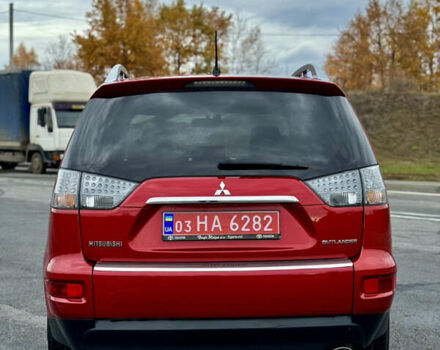 Красный Мицубиси Аутлендер, объемом двигателя 2 л и пробегом 204 тыс. км за 10350 $, фото 5 на Automoto.ua