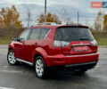 Красный Мицубиси Аутлендер, объемом двигателя 2 л и пробегом 204 тыс. км за 10350 $, фото 4 на Automoto.ua