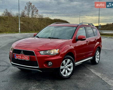 Красный Мицубиси Аутлендер, объемом двигателя 2 л и пробегом 204 тыс. км за 10350 $, фото 2 на Automoto.ua