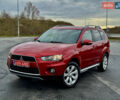 Красный Мицубиси Аутлендер, объемом двигателя 2 л и пробегом 204 тыс. км за 10350 $, фото 2 на Automoto.ua