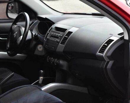 Красный Мицубиси Аутлендер, объемом двигателя 2.4 л и пробегом 204 тыс. км за 9499 $, фото 9 на Automoto.ua