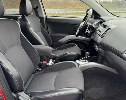 Красный Мицубиси Аутлендер, объемом двигателя 2 л и пробегом 204 тыс. км за 10350 $, фото 32 на Automoto.ua