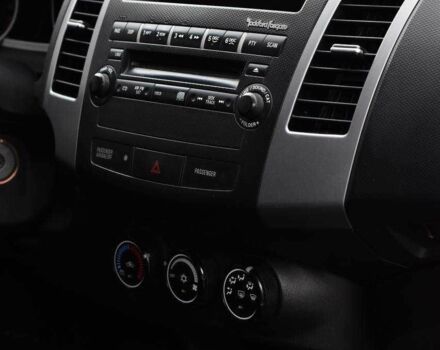 Красный Мицубиси Аутлендер, объемом двигателя 2.4 л и пробегом 204 тыс. км за 9499 $, фото 11 на Automoto.ua