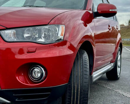 Красный Мицубиси Аутлендер, объемом двигателя 2 л и пробегом 204 тыс. км за 10350 $, фото 13 на Automoto.ua