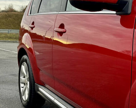 Красный Мицубиси Аутлендер, объемом двигателя 2 л и пробегом 204 тыс. км за 10350 $, фото 12 на Automoto.ua