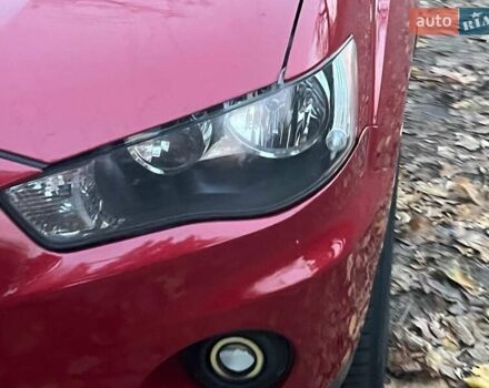 Красный Мицубиси Аутлендер, объемом двигателя 2.4 л и пробегом 251 тыс. км за 8990 $, фото 5 на Automoto.ua