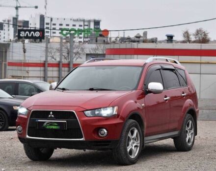 Красный Мицубиси Аутлендер, объемом двигателя 2.4 л и пробегом 204 тыс. км за 9499 $, фото 4 на Automoto.ua