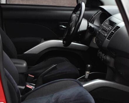 Красный Мицубиси Аутлендер, объемом двигателя 2.4 л и пробегом 204 тыс. км за 9499 $, фото 10 на Automoto.ua