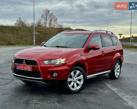 Красный Мицубиси Аутлендер, объемом двигателя 2 л и пробегом 204 тыс. км за 10350 $, фото 3 на Automoto.ua
