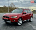 Красный Мицубиси Аутлендер, объемом двигателя 2 л и пробегом 204 тыс. км за 10350 $, фото 3 на Automoto.ua