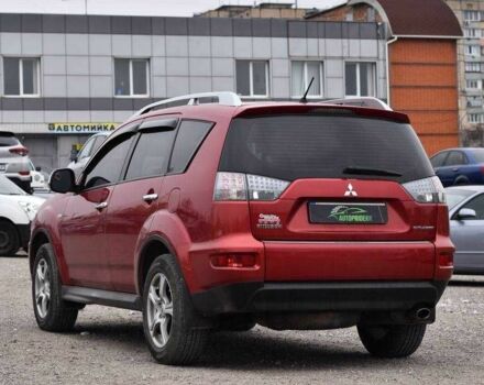 Красный Мицубиси Аутлендер, объемом двигателя 2.4 л и пробегом 204 тыс. км за 9499 $, фото 3 на Automoto.ua