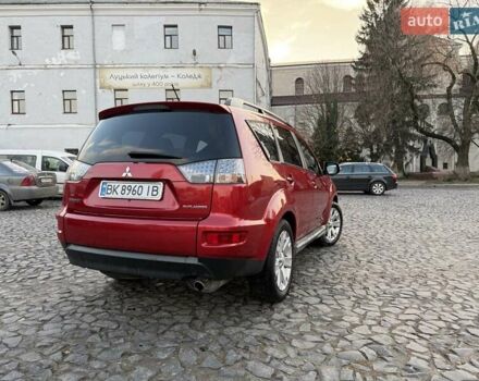 Красный Мицубиси Аутлендер, объемом двигателя 2.36 л и пробегом 134 тыс. км за 10600 $, фото 2 на Automoto.ua