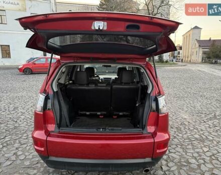 Красный Мицубиси Аутлендер, объемом двигателя 2.36 л и пробегом 134 тыс. км за 10600 $, фото 10 на Automoto.ua