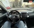 Красный Мицубиси Аутлендер, объемом двигателя 2.36 л и пробегом 134 тыс. км за 10600 $, фото 13 на Automoto.ua