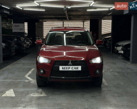 Красный Мицубиси Аутлендер, объемом двигателя 3 л и пробегом 270 тыс. км за 9500 $, фото 5 на Automoto.ua