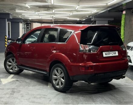 Красный Мицубиси Аутлендер, объемом двигателя 3 л и пробегом 210 тыс. км за 9500 $, фото 1 на Automoto.ua