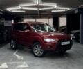 Красный Мицубиси Аутлендер, объемом двигателя 3 л и пробегом 210 тыс. км за 9500 $, фото 1 на Automoto.ua
