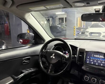 Красный Мицубиси Аутлендер, объемом двигателя 3 л и пробегом 210 тыс. км за 9500 $, фото 7 на Automoto.ua