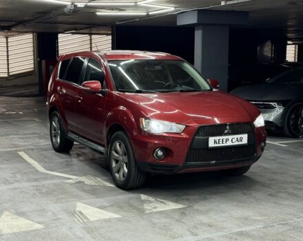 Красный Мицубиси Аутлендер, объемом двигателя 3 л и пробегом 210 тыс. км за 9500 $, фото 2 на Automoto.ua