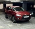 Красный Мицубиси Аутлендер, объемом двигателя 3 л и пробегом 210 тыс. км за 9500 $, фото 2 на Automoto.ua