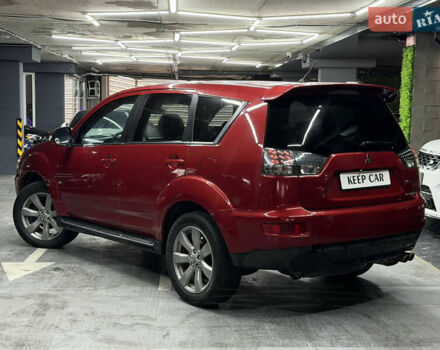 Красный Мицубиси Аутлендер, объемом двигателя 3 л и пробегом 270 тыс. км за 9500 $, фото 4 на Automoto.ua