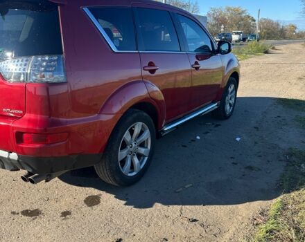 Міцубісі Аутлендер 2011 у Чорноморську (Іллічівську) на Automoto.ua Червоний Міцубісі Аутлендер, об'ємом двигуна 3 л та пробігом 200 тис. км за 11000 $, фото 3 на Automoto.ua