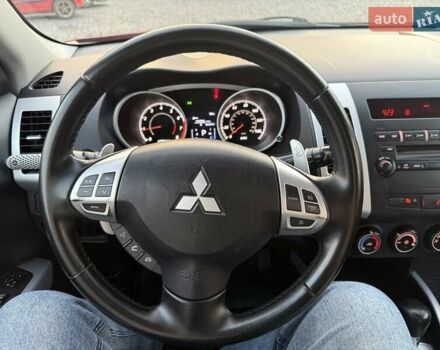 Красный Мицубиси Аутлендер, объемом двигателя 2.36 л и пробегом 134 тыс. км за 10600 $, фото 14 на Automoto.ua