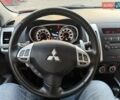 Красный Мицубиси Аутлендер, объемом двигателя 2.36 л и пробегом 134 тыс. км за 10600 $, фото 14 на Automoto.ua