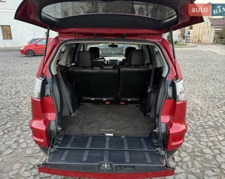 Красный Мицубиси Аутлендер, объемом двигателя 2.36 л и пробегом 134 тыс. км за 10600 $, фото 11 на Automoto.ua