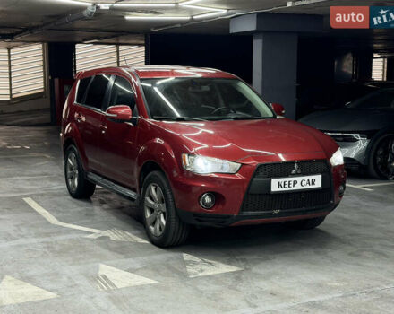 Красный Мицубиси Аутлендер, объемом двигателя 3 л и пробегом 270 тыс. км за 9500 $, фото 6 на Automoto.ua
