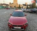 Красный Мицубиси Аутлендер, объемом двигателя 2.36 л и пробегом 134 тыс. км за 10600 $, фото 5 на Automoto.ua