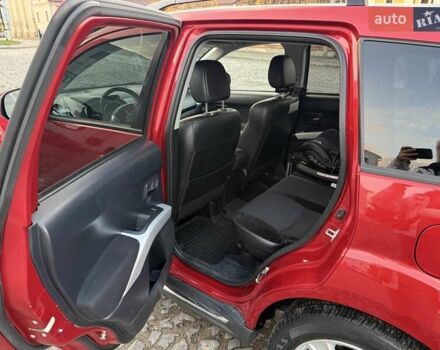 Красный Мицубиси Аутлендер, объемом двигателя 2.36 л и пробегом 134 тыс. км за 10600 $, фото 9 на Automoto.ua