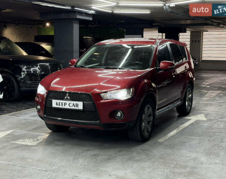 Красный Мицубиси Аутлендер, объемом двигателя 3 л и пробегом 270 тыс. км за 9500 $, фото 7 на Automoto.ua